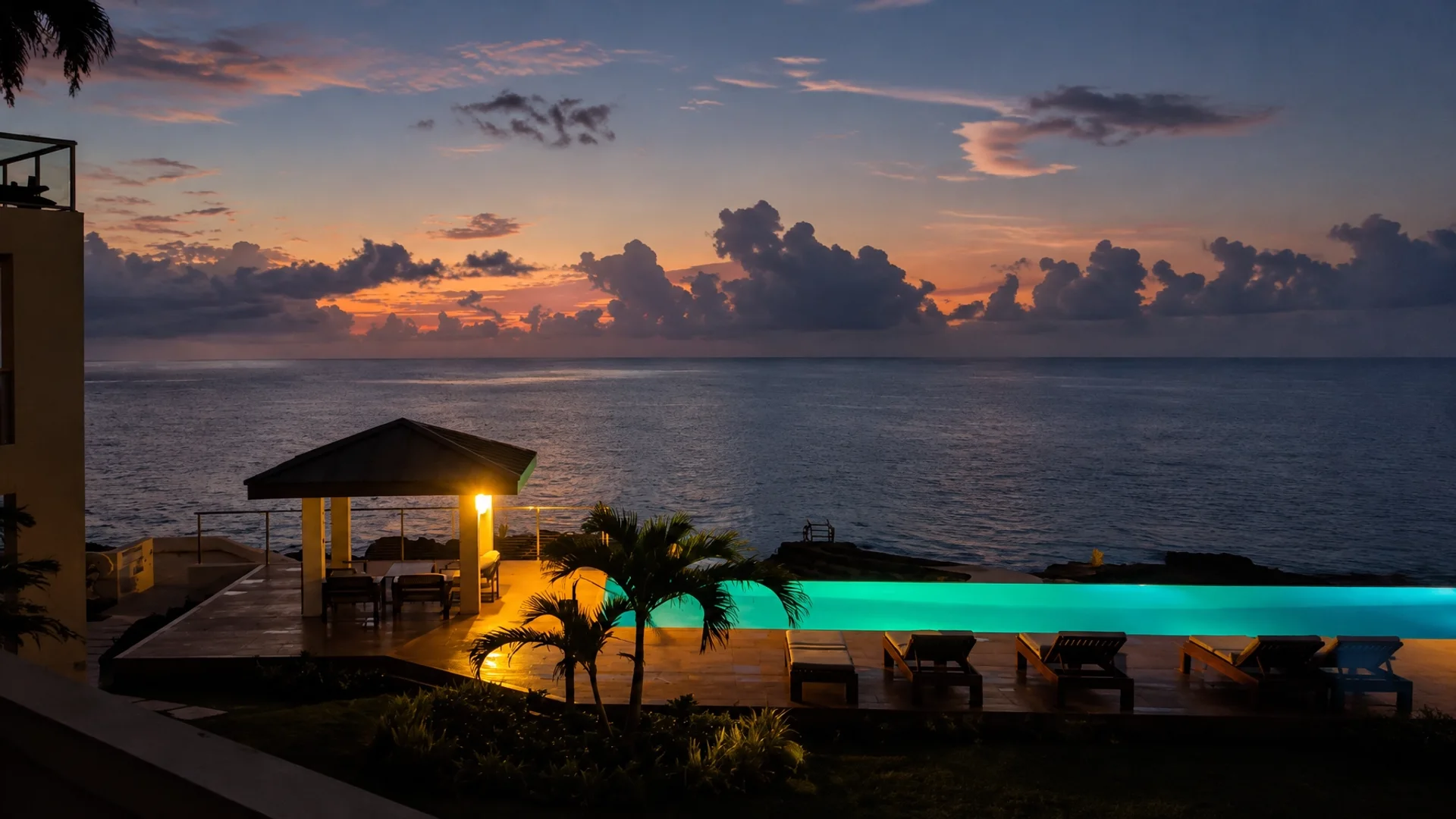 Grand Cayman sunset over the infinity pool and gazebo